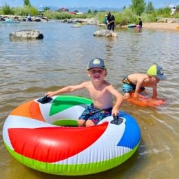 children playing in a river