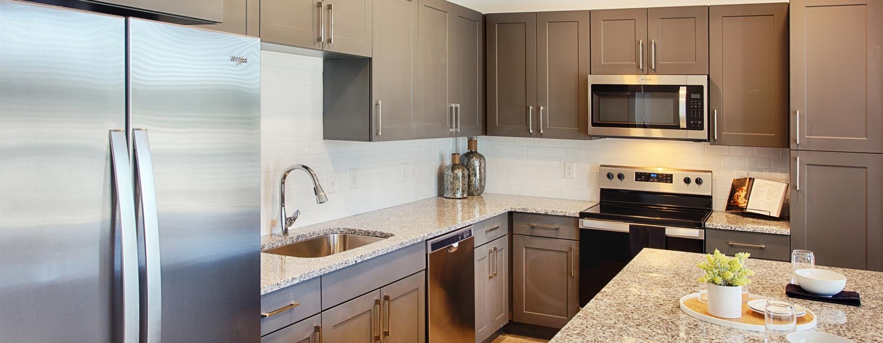a kitchen with stainless steel appliances