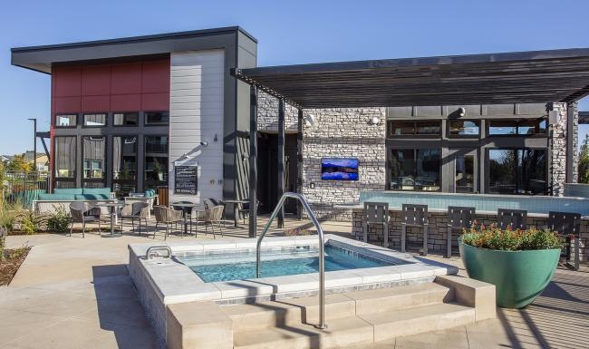 a hot tub near a building