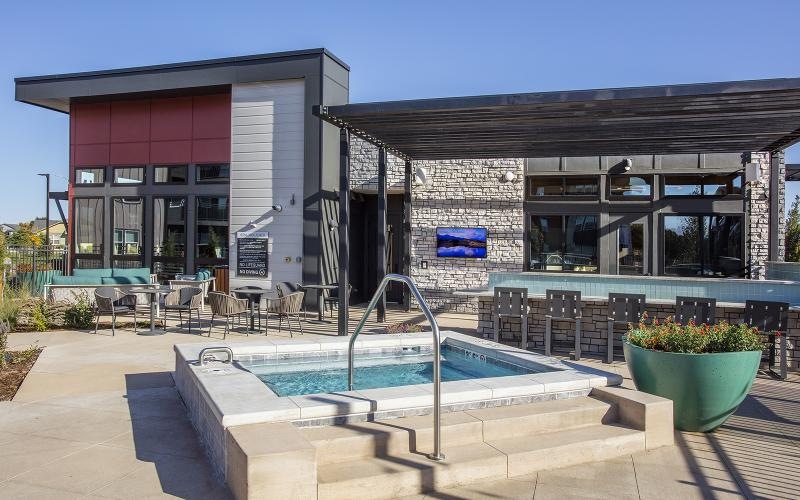 a hot tub near a building